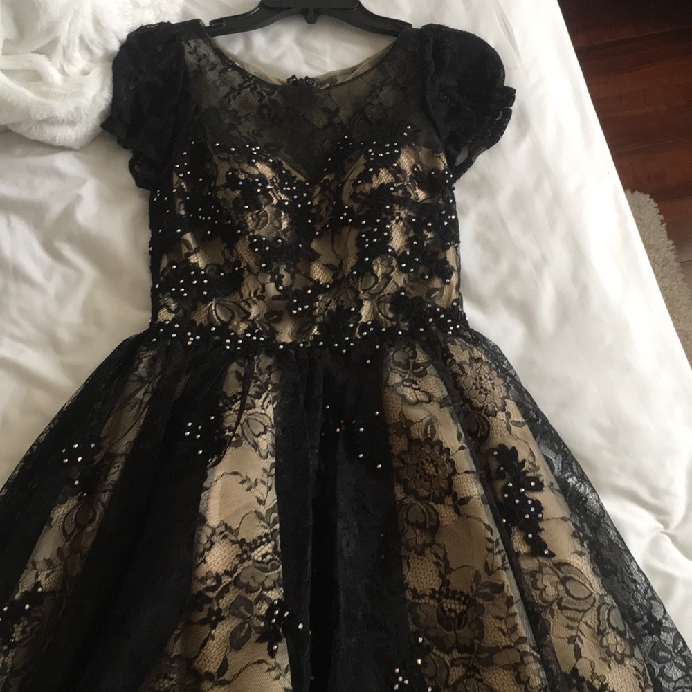 Black lace dress with nude under